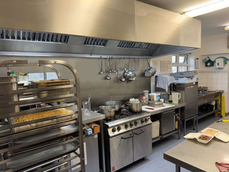 The Kitchen This catering kitchen is well loved by caterers who use us to prepare food for a variety of functions. There is a 6 burner catering oven. Catering microwave. High speed dishwasher. Hot water urns. Tableware crockery provided as well as knives and forks.